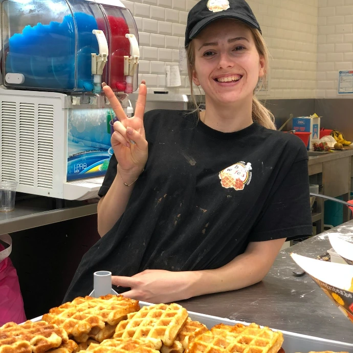 a young woman working in the food industry