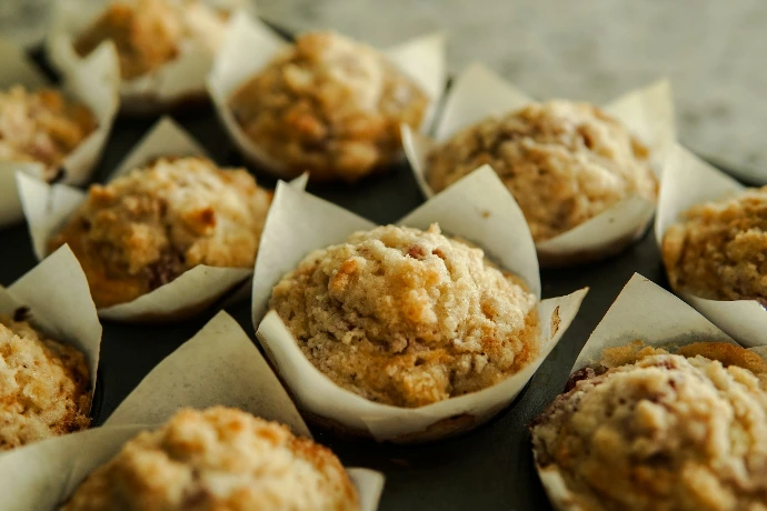 a bunch of muffins sitting on top of a table